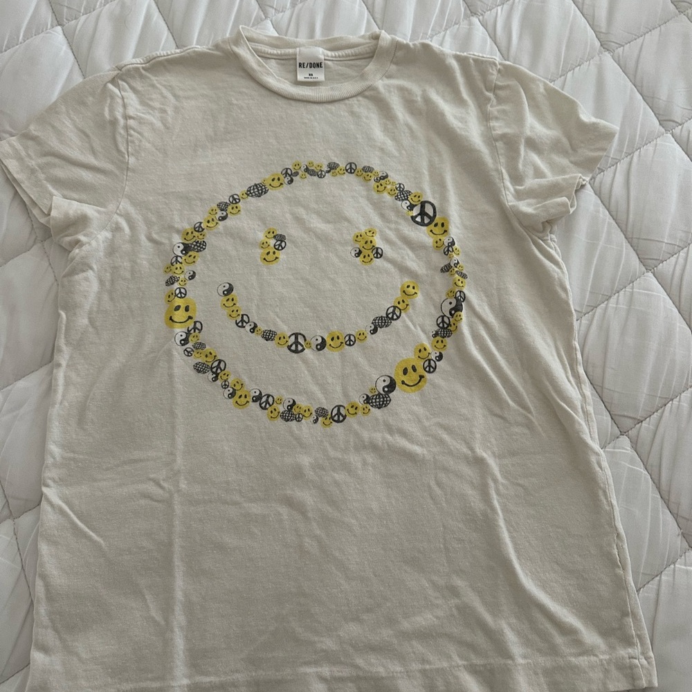 White T-Shirt with Smiley Face Design